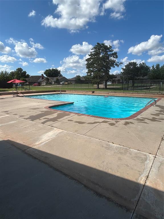 1536 Kingsgate Rd, Oklahoma City, OK 73159 - community pool featuring a patio area