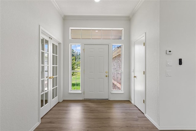 2719 NW 30th St, Newcastle, OK 73065 - entrance foyer featuring crown molding and wood finished floors
