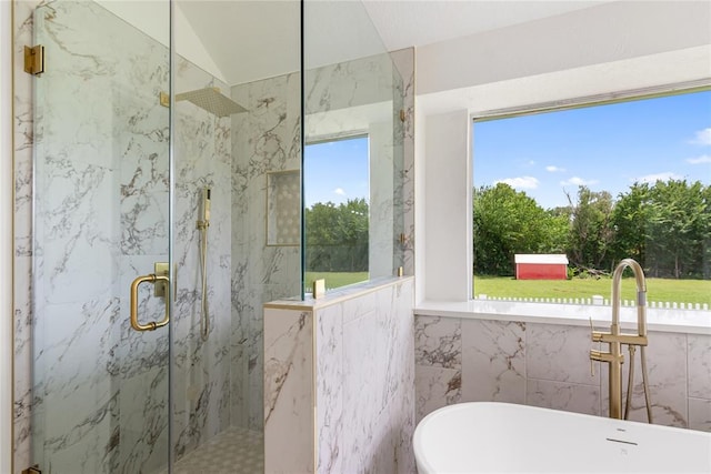 2719 NW 30th St, Newcastle, OK 73065 - bathroom with a marble finish shower, a freestanding bath, tile walls, and lofted ceiling
