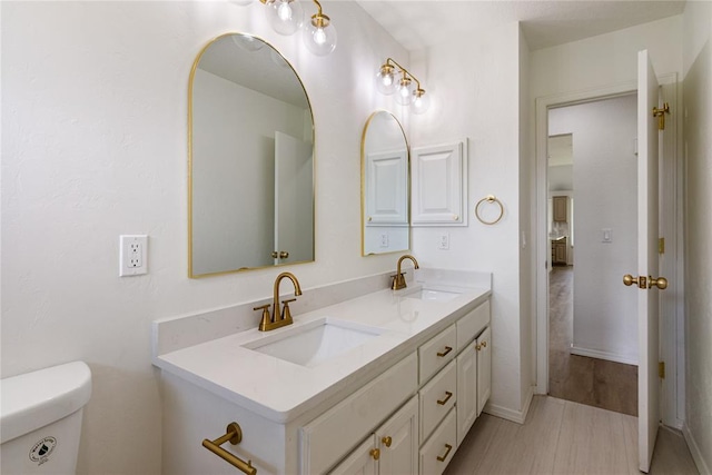 2719 NW 30th St, Newcastle, OK 73065 - bathroom featuring double vanity and toilet