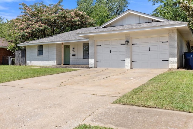 9617 Georgia Ave, Oklahoma City, OK 73120 - ranch-style house with brick siding, board and batten siding, and a front yard