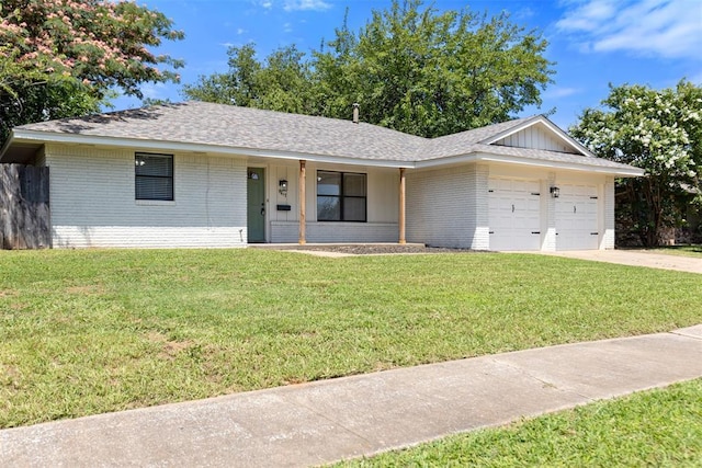9617 Georgia Ave, Oklahoma City, OK 73120 - single story home featuring brick siding, a garage, a front lawn, a shingled roof, and board and batten siding