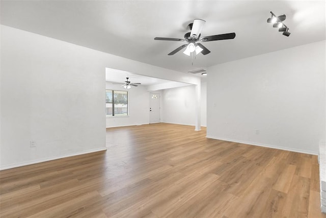 9617 Georgia Ave, Oklahoma City, OK 73120 - unfurnished living room with a ceiling fan and light wood-type flooring