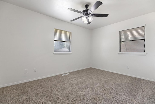 9617 Georgia Ave, Oklahoma City, OK 73120 - carpeted spare room featuring a ceiling fan and baseboards