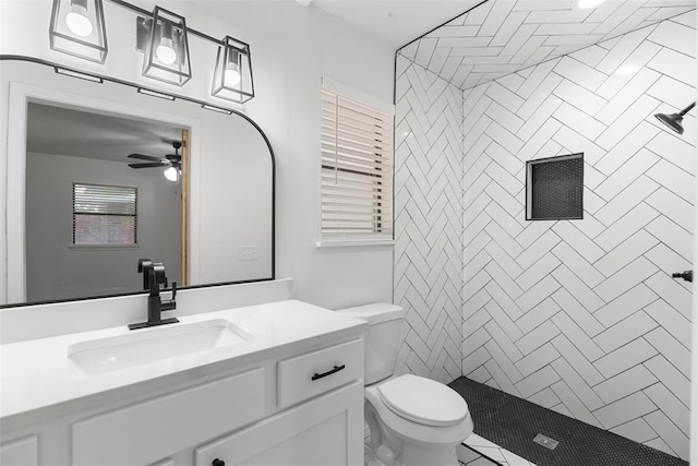 9617 Georgia Ave, Oklahoma City, OK 73120 - full bathroom featuring vanity, tiled shower, and a ceiling fan