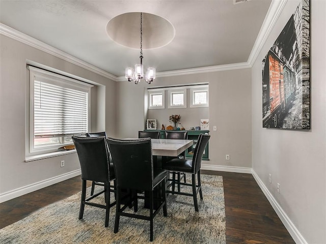 7032 NW 159th Pl, Edmond, OK 73013 - dining space featuring a chandelier, crown molding, dark wood-type flooring, and plenty of natural light