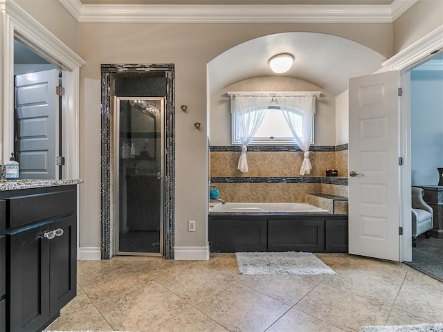 7032 NW 159th Pl, Edmond, OK 73013 - bathroom featuring a garden tub, a stall shower, crown molding, vanity, and tile patterned flooring