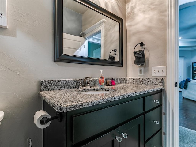 7032 NW 159th Pl, Edmond, OK 73013 - bathroom featuring vanity and wood finished floors