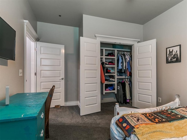 7032 NW 159th Pl, Edmond, OK 73013 - bedroom with dark colored carpet and a closet