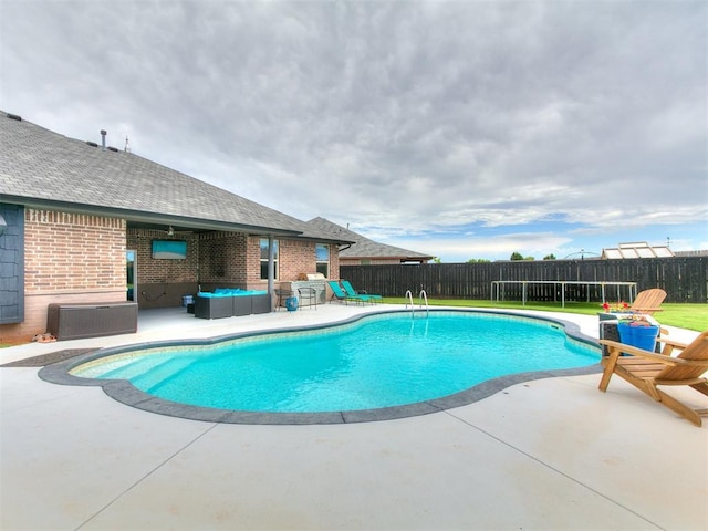 7032 NW 159th Pl, Edmond, OK 73013 - view of swimming pool featuring a patio area, a fenced backyard, and an outdoor living space