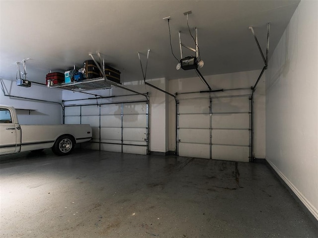 7032 NW 159th Pl, Edmond, OK 73013 - garage featuring a garage door opener
