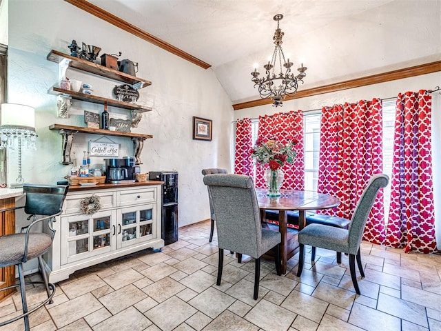 117 S Lexington Way, Edmond, OK 73012 - dining space featuring stone tile flooring, crown molding, a chandelier, and vaulted ceiling
