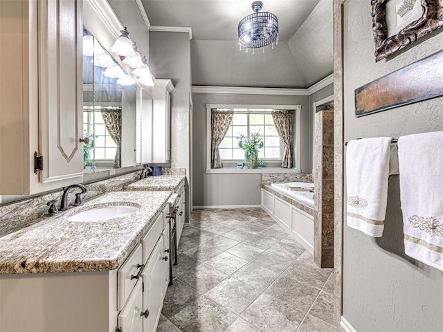 117 S Lexington Way, Edmond, OK 73012 - full bath featuring healthy amount of natural light, double vanity, a garden tub, and ornamental molding