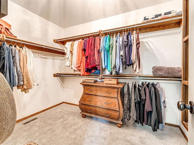 117 S Lexington Way, Edmond, OK 73012 - walk in closet featuring carpet floors