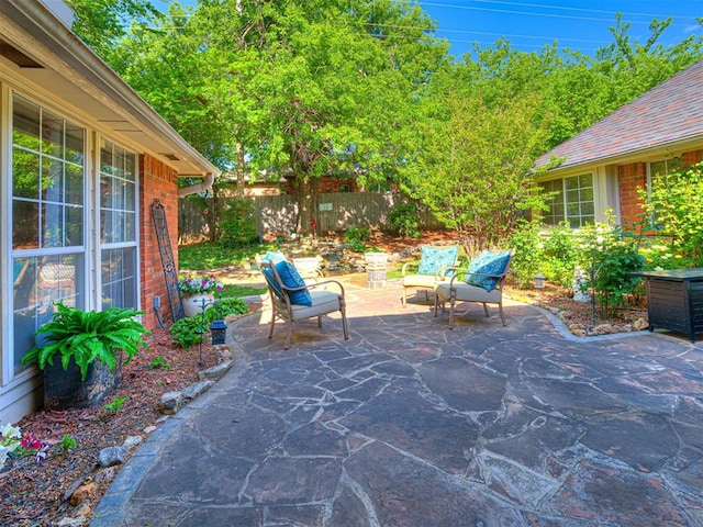 117 S Lexington Way, Edmond, OK 73012 - fenced backyard featuring a patio area