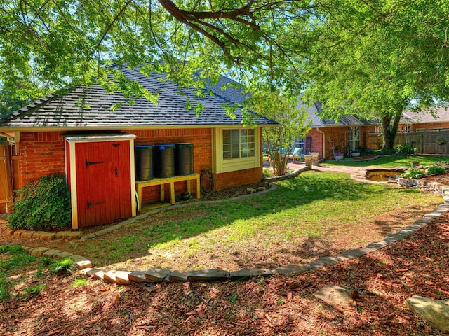 117 S Lexington Way, Edmond, OK 73012 - view of yard with an outbuilding