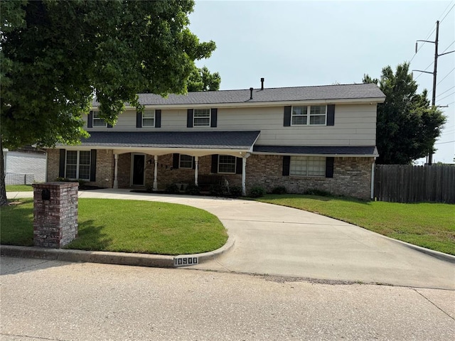 10900 Rock Ridge Rd, Oklahoma City, OK 73120 - traditional-style home featuring curved driveway and brick siding