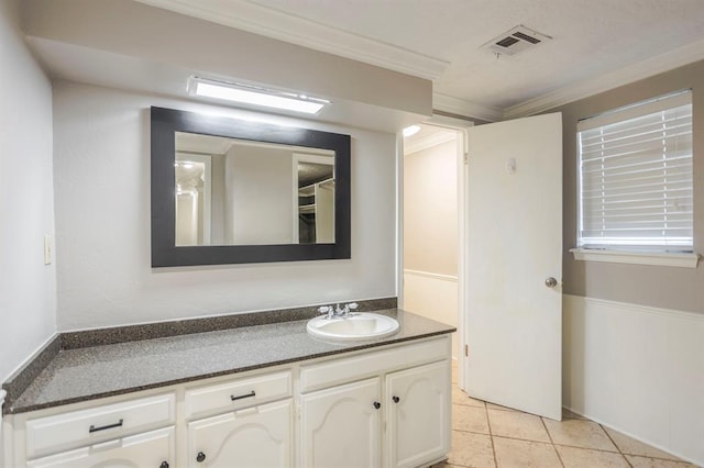 10900 Rock Ridge Rd, Oklahoma City, OK 73120 - bathroom featuring vanity, ornamental molding, and tile patterned floors