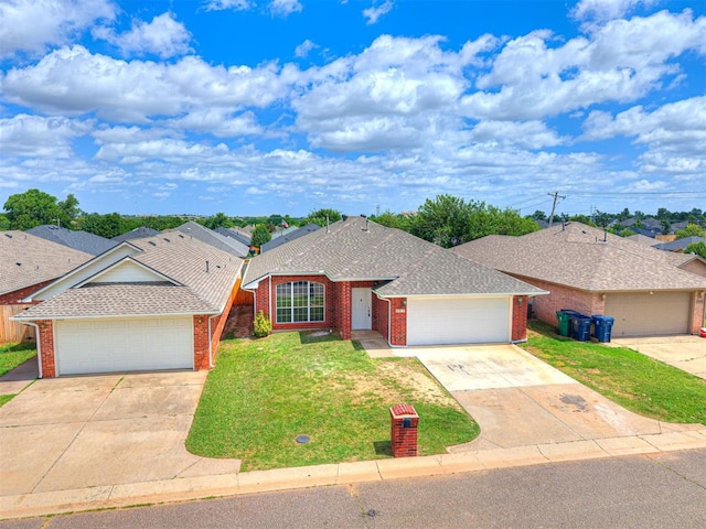 4917 SE 89th Ter, Oklahoma City, OK 73135 - ranch-style house with brick siding, a front yard, concrete driveway, and a garage
