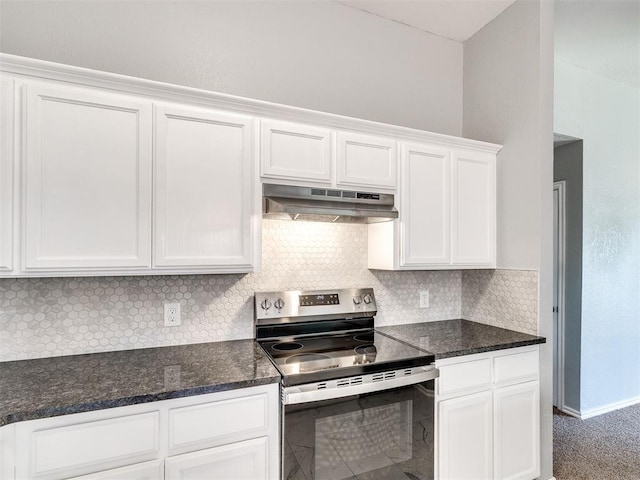 4917 SE 89th Ter, Oklahoma City, OK 73135 - kitchen featuring stainless steel electric range, under cabinet range hood, white cabinetry, tasteful backsplash, and dark stone countertops