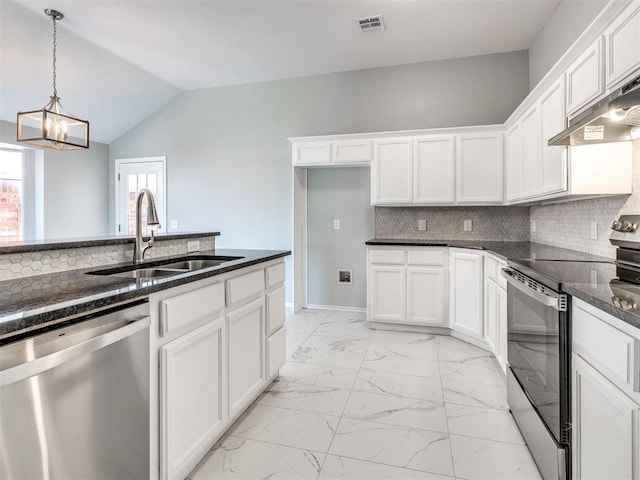 4917 SE 89th Ter, Oklahoma City, OK 73135 - kitchen with appliances with stainless steel finishes, light marble finish floors, a chandelier, white cabinets, and pendant lighting