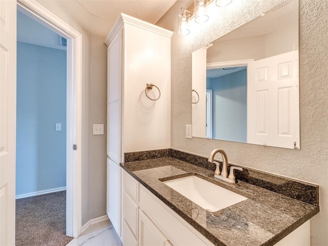 4917 SE 89th Ter, Oklahoma City, OK 73135 - bathroom with vanity and marble look tile flooring