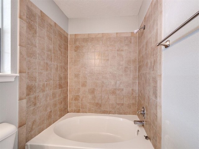4917 SE 89th Ter, Oklahoma City, OK 73135 - full bath featuring bathtub / shower combination and a textured ceiling