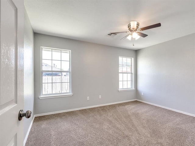 4917 SE 89th Ter, Oklahoma City, OK 73135 - empty room with carpet flooring and ceiling fan