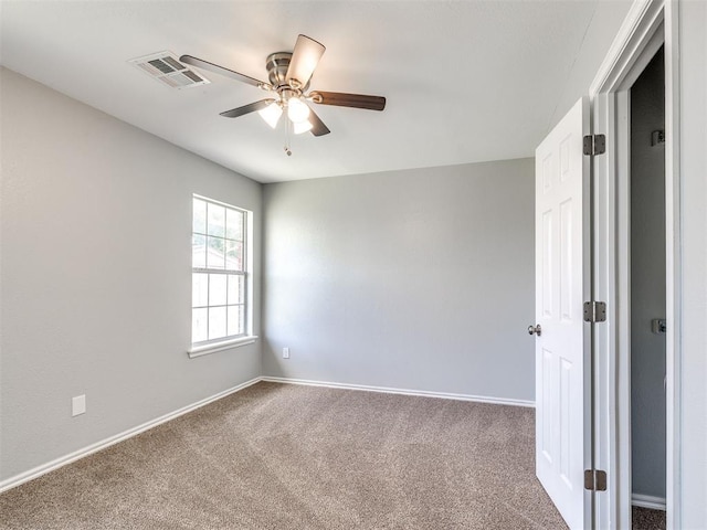 4917 SE 89th Ter, Oklahoma City, OK 73135 - carpeted spare room with ceiling fan and baseboards