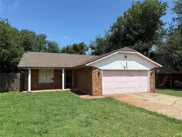 5333 Coble St, Oklahoma City, OK 73135 - single story home featuring an attached garage, brick siding, driveway, and a shingled roof