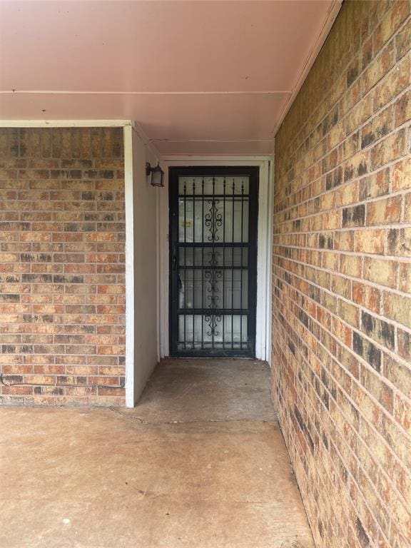 5333 Coble St, Oklahoma City, OK 73135 - property entrance featuring brick siding