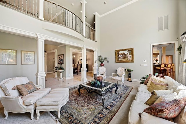 1608 Mulholland Dr, Edmond, OK 73003 - living room featuring ornate columns and a high ceiling