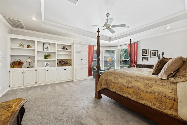 1608 Mulholland Dr, Edmond, OK 73003 - bedroom with ornamental molding, a tray ceiling, light carpet, recessed lighting, and ceiling fan