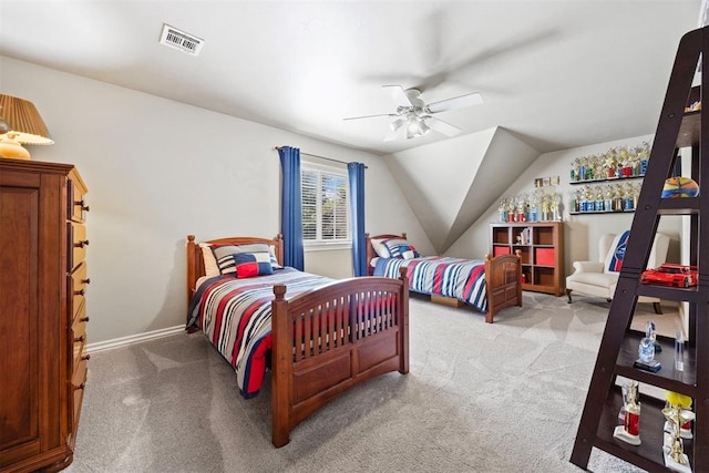 1608 Mulholland Dr, Edmond, OK 73003 - bedroom with light colored carpet, ceiling fan, and lofted ceiling