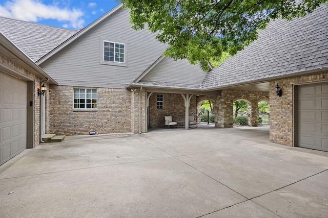 1608 Mulholland Dr, Edmond, OK 73003 - exterior space featuring a garage