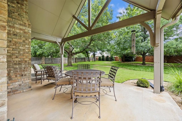 1608 Mulholland Dr, Edmond, OK 73003 - fenced backyard featuring outdoor dining space and a patio area
