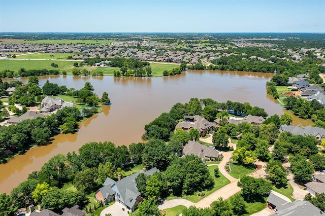 1608 Mulholland Dr, Edmond, OK 73003 - aerial view of residential area featuring a large body of water