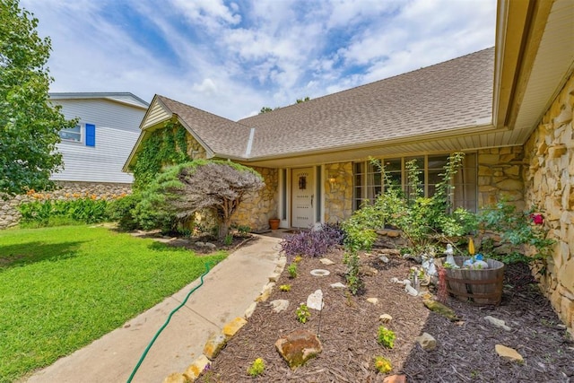 11900 Surrey Ln, Yukon, OK 73099 - view of front of property with stone siding, a shingled roof, and a front yard