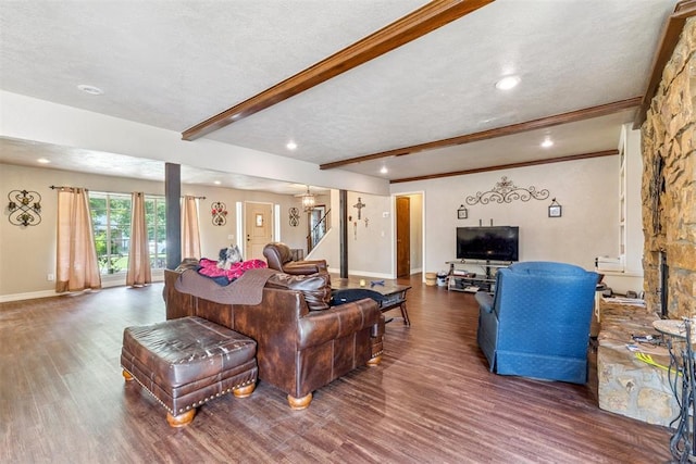 11900 Surrey Ln, Yukon, OK 73099 - living area with wood finished floors, beamed ceiling, recessed lighting, ornamental molding, and stairs