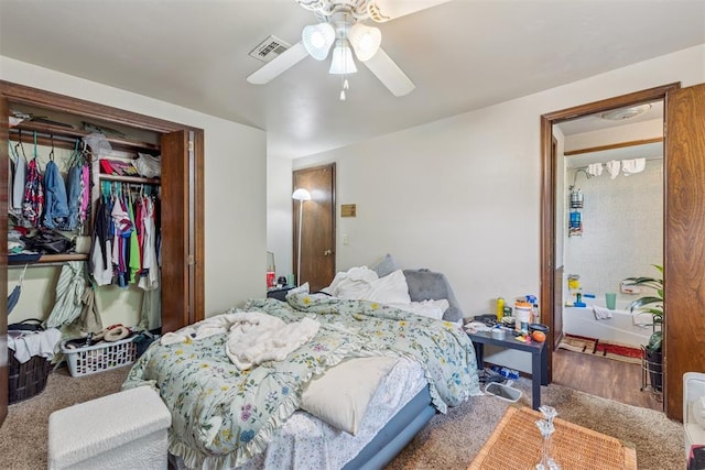 11900 Surrey Ln, Yukon, OK 73099 - bedroom with a closet and ceiling fan