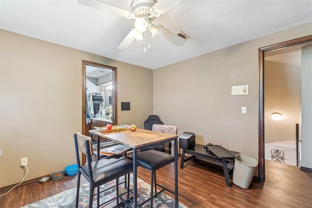 11900 Surrey Ln, Yukon, OK 73099 - dining space featuring wood finished floors and ceiling fan