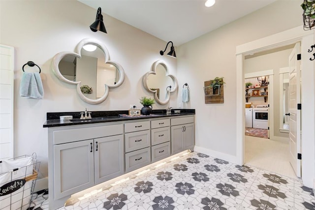 209 Pont Julienn Ct, Edmond, OK 73034 - full bathroom featuring washer / dryer and double vanity