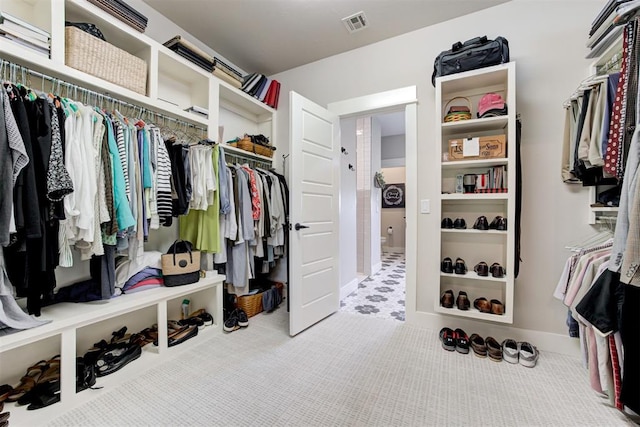 209 Pont Julienn Ct, Edmond, OK 73034 - walk in closet with carpet