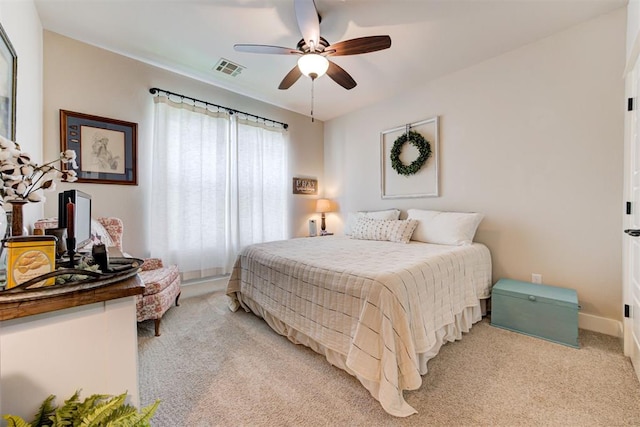 209 Pont Julienn Ct, Edmond, OK 73034 - bedroom with light colored carpet and a ceiling fan