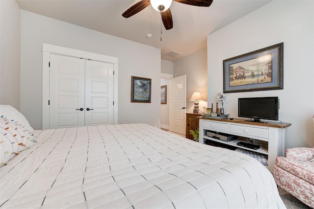 209 Pont Julienn Ct, Edmond, OK 73034 - bedroom with a closet and a ceiling fan