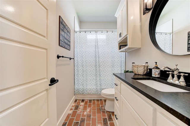 209 Pont Julienn Ct, Edmond, OK 73034 - full bathroom featuring brick flooring, vanity, and shower / bath combo with shower curtain