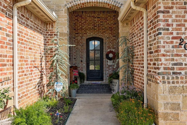 209 Pont Julienn Ct, Edmond, OK 73034 - doorway to property featuring brick siding