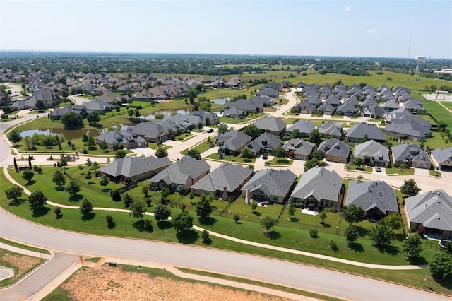 209 Pont Julienn Ct, Edmond, OK 73034 - aerial view of property's location featuring nearby suburban area and a large body of water
