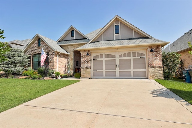 209 Pont Julienn Ct, Edmond, OK 73034 - view of front of home featuring a front yard, driveway, and brick siding