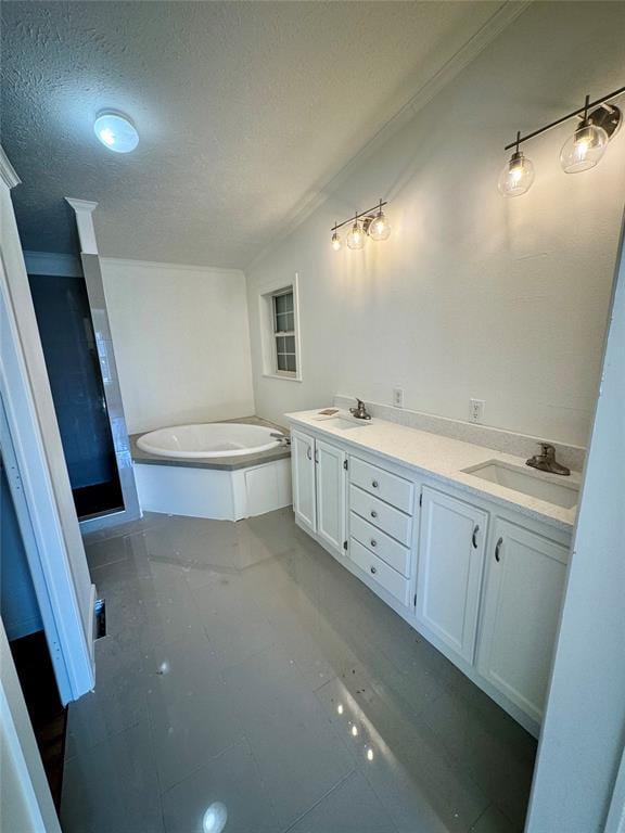 2099 County Road 1244, Tuttle, OK 73089 - bathroom with a bath, a textured ceiling, double vanity, and ornamental molding